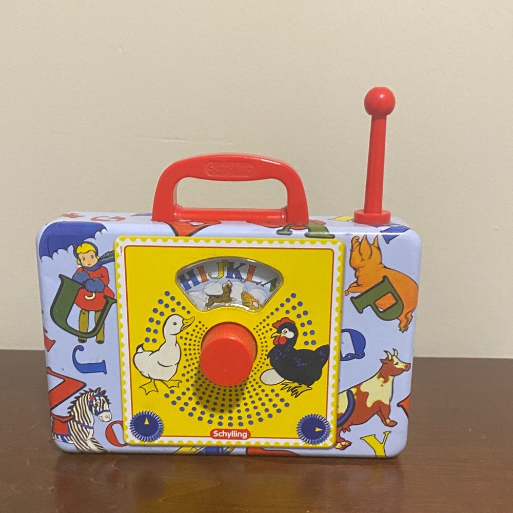 Schylling Musical Toy Radio - Red, Yellow, and Blue